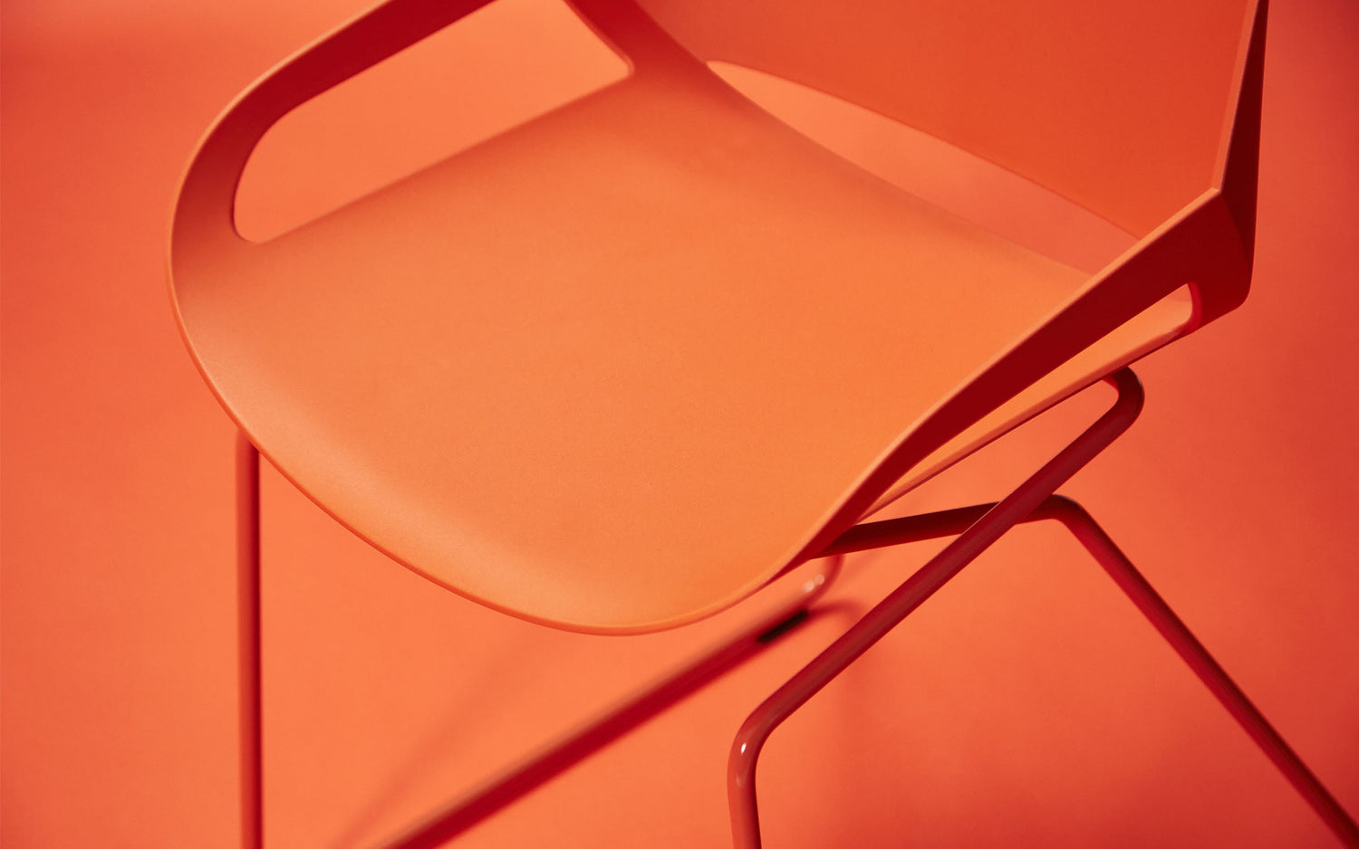 Aeris Numo skid frame in orange-red